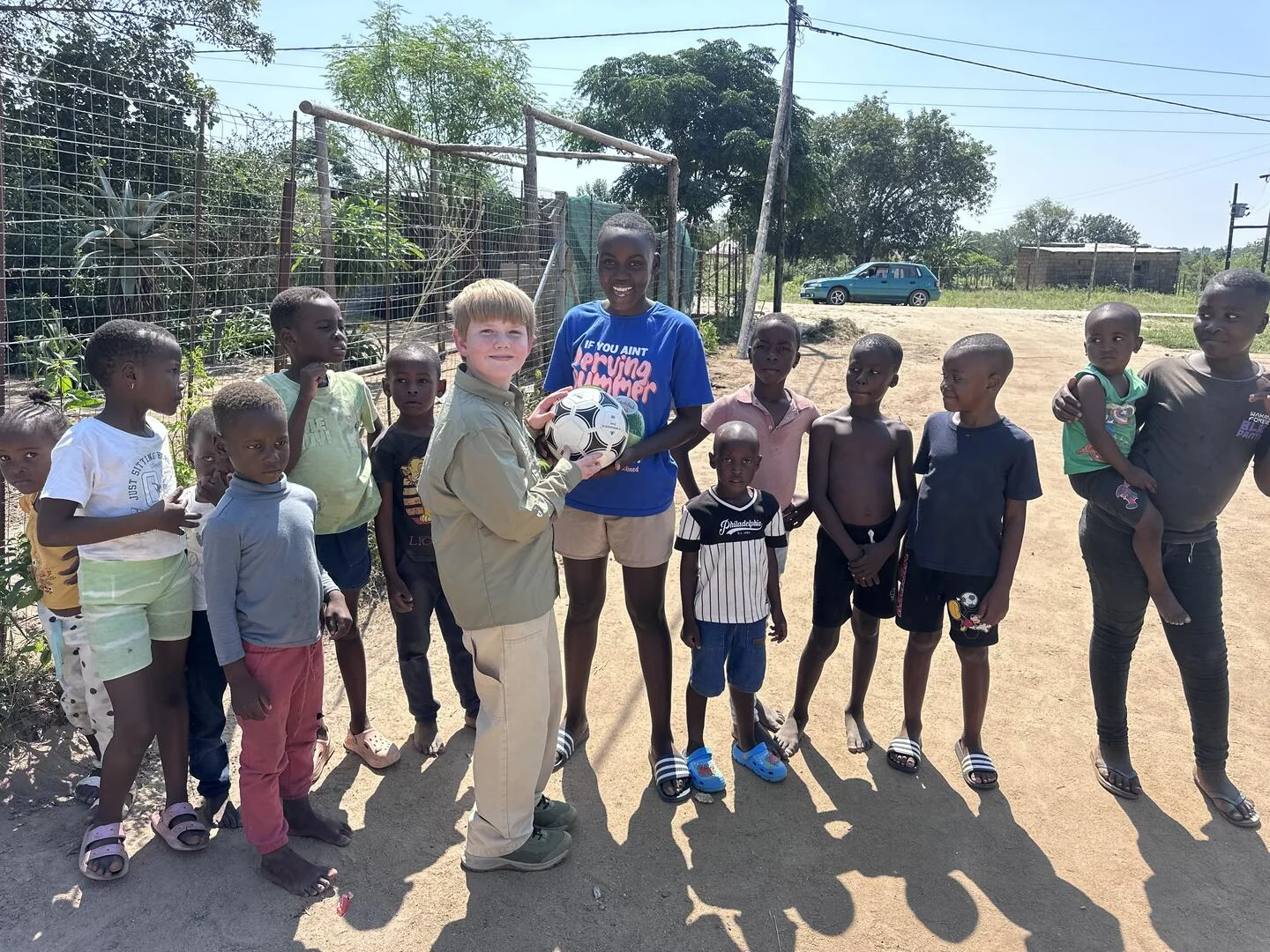 Lotus Impact Foundation volunteers working together outdoors in the community